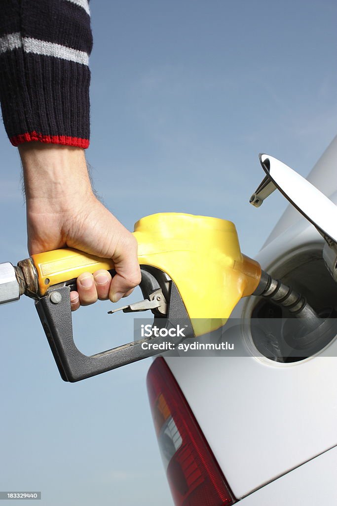 Mão de bombeamento gasolina - Foto de stock de Agarrar royalty-free