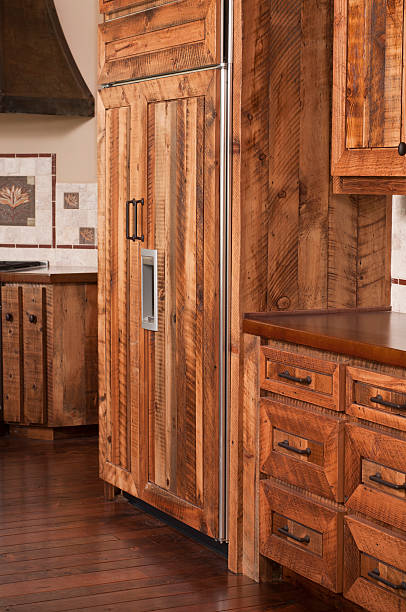 istock Kitchen with hardwood cabinets and floor. 183329540