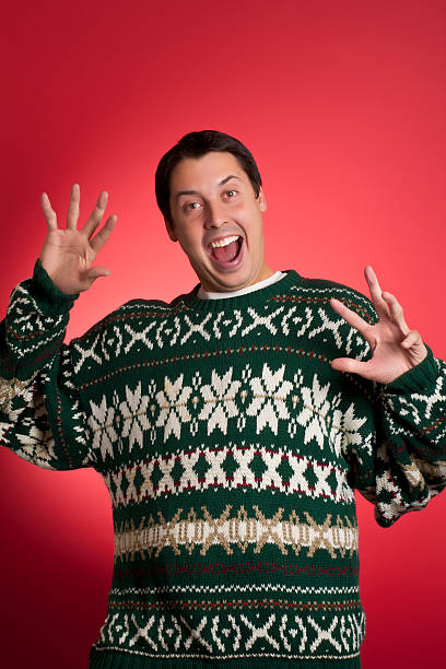 Super Excited Sweater Man A very surprised sweater man christmas ugliness sweater nerd stock pictures, royalty-free photos & images