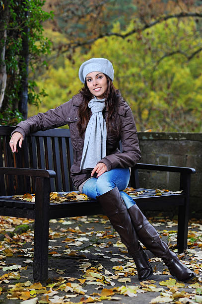istock Fall Happy Young Woman relaxing on Bank 183329832