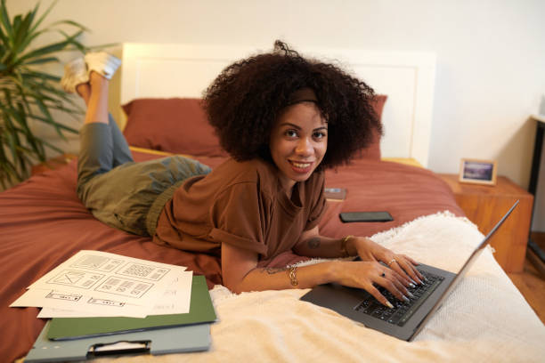 istock UI Designer Working in Bedroom 1833301442