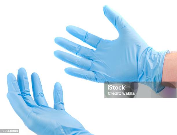 Prepárate Para El Tratamiento De Los Médicos Mano En Guante Azul Higiénico Foto de stock y más banco de imágenes de Guante