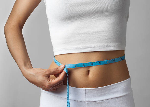 istock Thin woman measuring waist 183330290