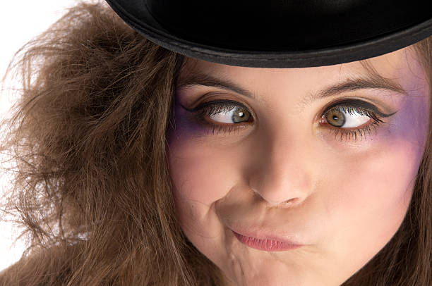 istock Mad Hatter girl with cross-eyes. 183330594