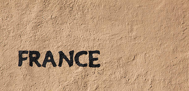 istock FRANCE Sign Painted on Stucco Wall 183330759