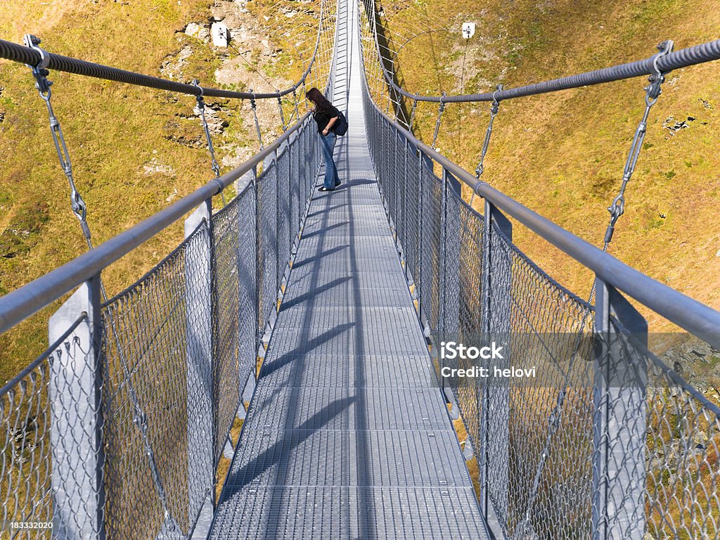 Ponte suspensa sobre Stubnerkogel - Foto de stock de Adulto royalty-free