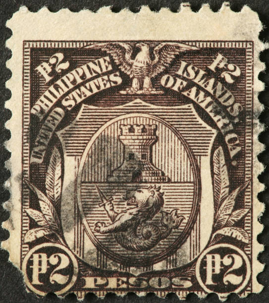 istock old Philippine stamp with lion and castle shield 183332398