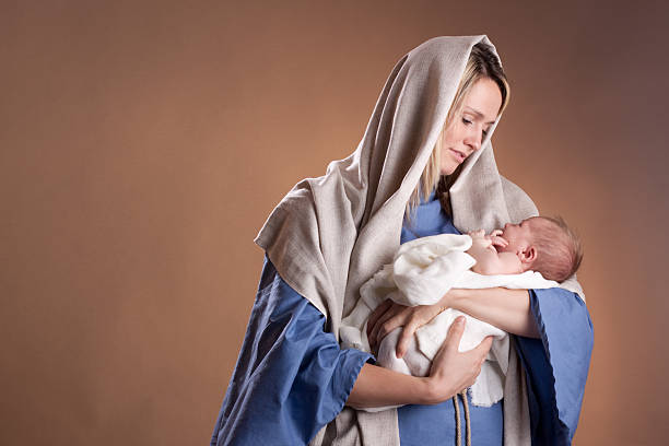 Nativity scene with real mother and baby.