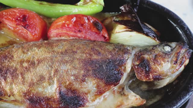 Trout fish in a pot