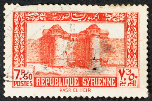 Syrian postage stamp isolated on black