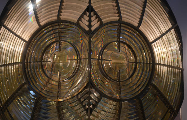 A Fresnel lens in a lighthouse stock photo
