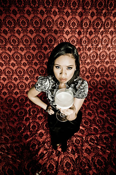 Beautiful Woman Drinking Milk from a Wine Glass (series)