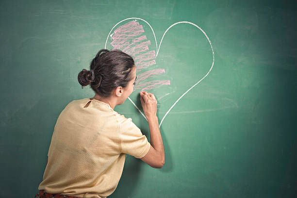 istock Woman Drawing Heart 183334074