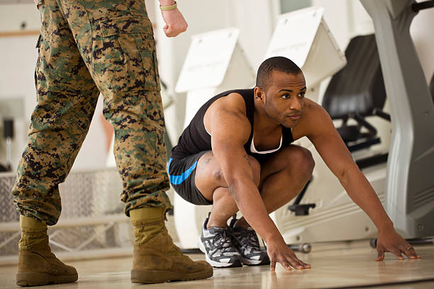 istock Trainee Doing Burpees at a Fitness Bootcamp 183335545
