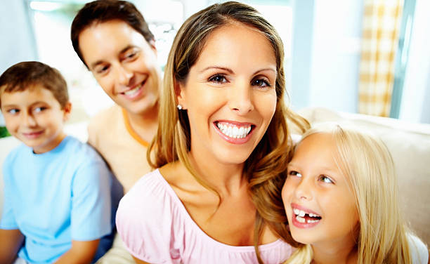 istock Cheerful woman with her family having fun 183335593