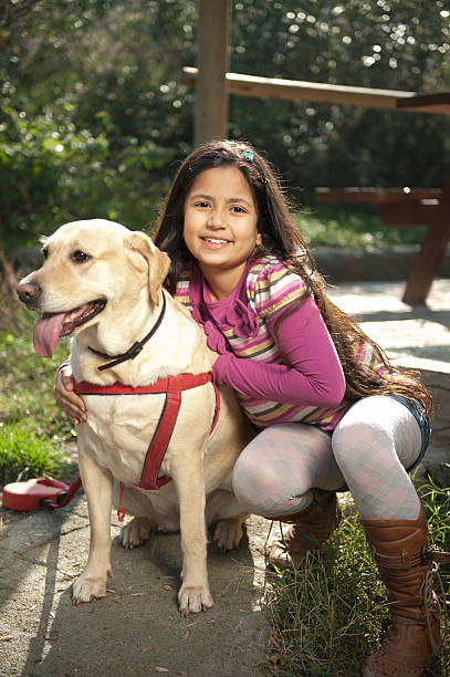 istock Little Girl and Dog 183336057