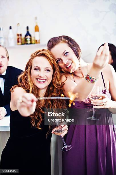 Friends With Sparklers Stock Photo - Download Image Now - Dancing, Indoors, Only Women