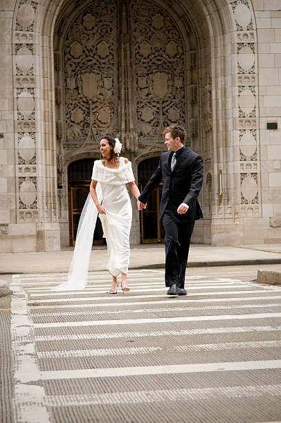 istock Bride and Groom cross a Chicago street 183336476