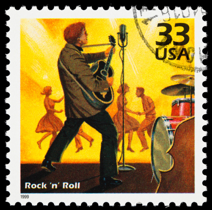 United States postage stamp with an illustration of a 1950s rock 'n' roll band with dancers in the background.