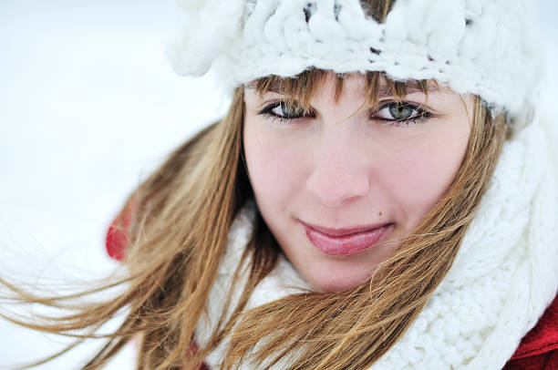 istock Young beautiful woman looking at camera in winter time 183336588