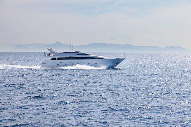 Luxury yacht sailing  at sea with high speed
