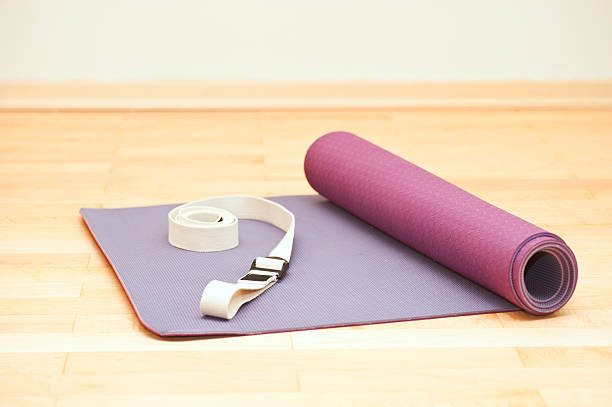 istock yoga matte on wodden floor 183337279