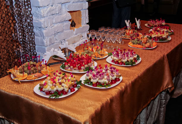istock catering wedding buffet with different food snacks and appetizers. 1833373820