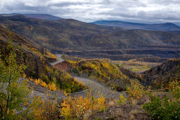 Telegraph Creek road ,Highway 51, a steep narrow gravel road, with steep grades, and dangerous switchbacks,  winds through the Stikine River Valley to Telegraph Creek, in British Columbia during the autumn of 2023, overlooking ancient lava fields