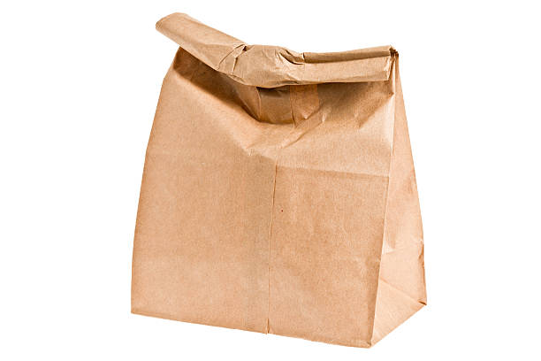 коричневый бумажный мешок обеда - paper bag bag brown handle стоковые фото и изображения