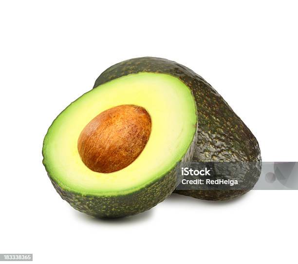 Avocados Con Pit Foto de stock y más banco de imágenes de Aguacate - Aguacate, Recortable, Fondo blanco