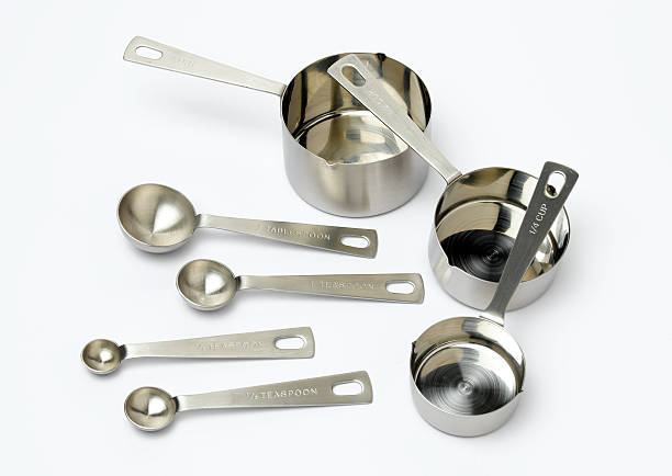 colheres e panelas - kitchen utensil instrument of measurement spoon isolated - fotografias e filmes do acervo