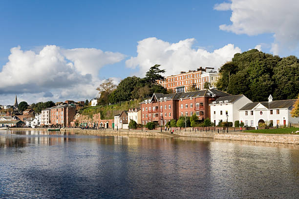 The river Exe and Exeter quayside in Devon "The river Exe and river-front properties, leading to Exeters Historic Quay." exeter england stock pictures, royalty-free photos & images