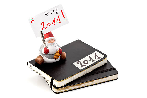 istock notebooks and best wishes for a happy 2011 183339061