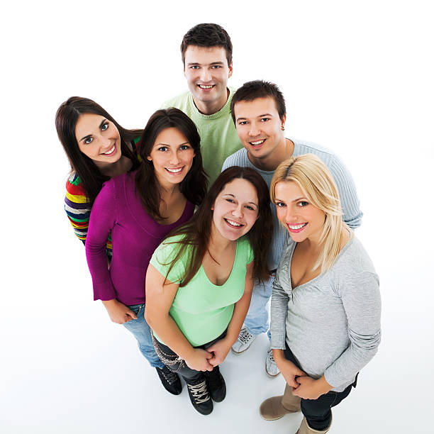 istock Group of happy young people standing on white background 183339111