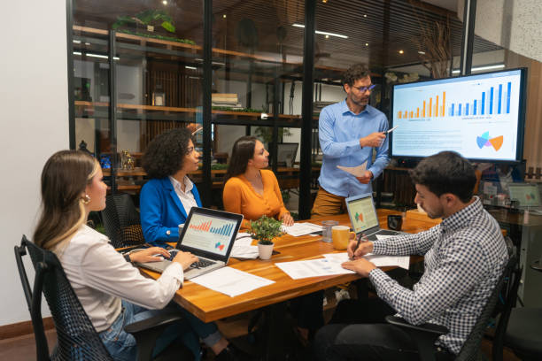 istock Business man making a presentation to his team at the office 1833393156