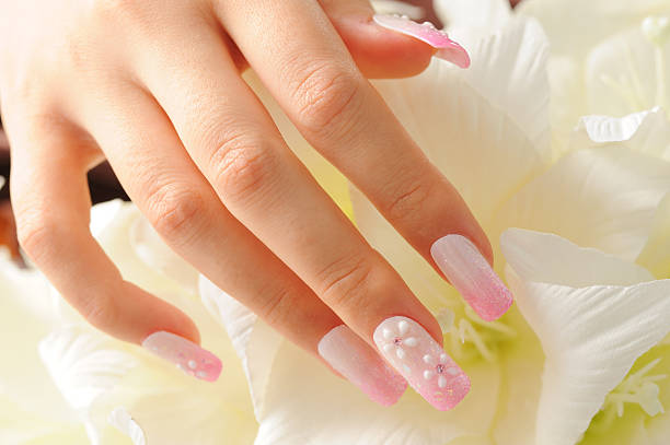 Beautiful woman hand with design of fingernail
