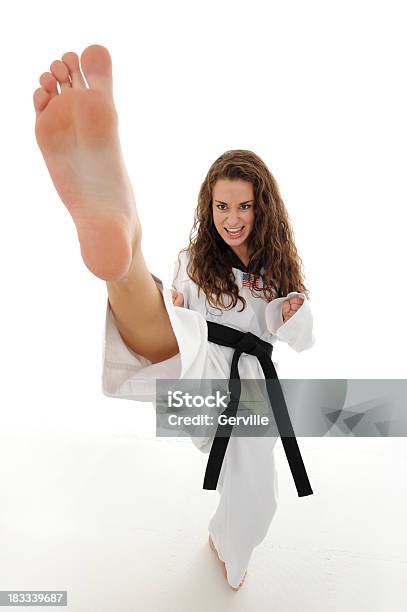 Striking High Stock Photo - Download Image Now - Combat Sport, Karate, Kicking