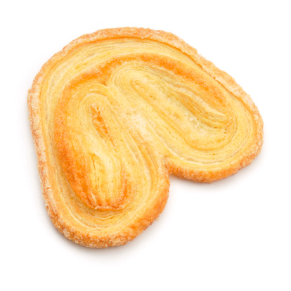 A Palmier - french pastry isolated on a white background.