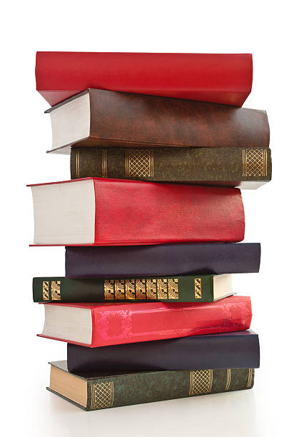 istock Colorful stack of a variety of books on a white surface 183340062