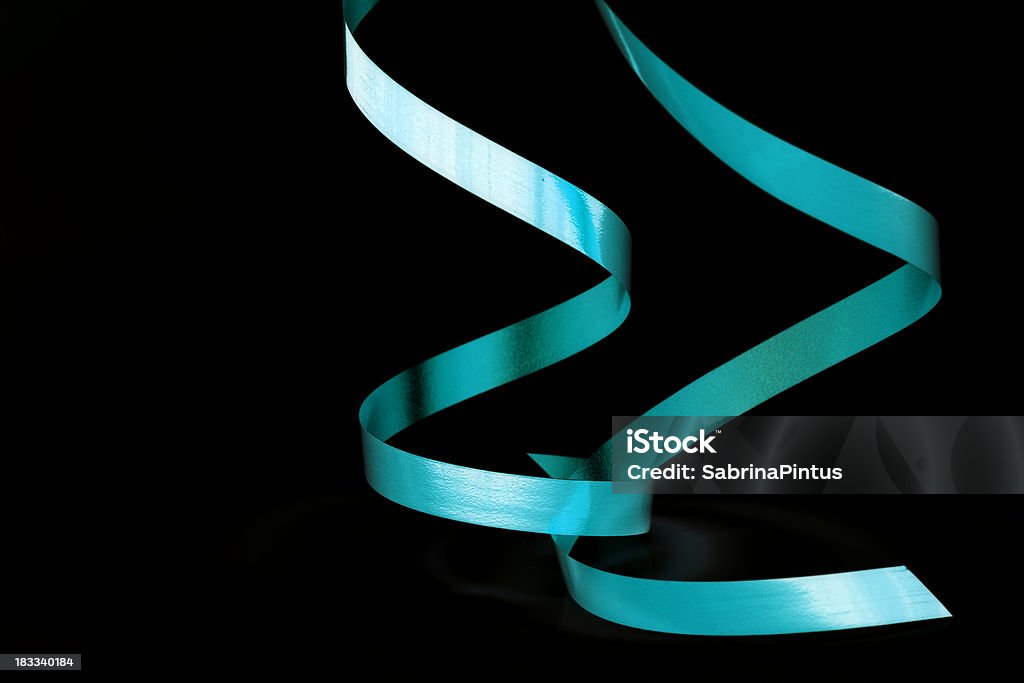two green ribbons isolated on black Streamer Stock Photo