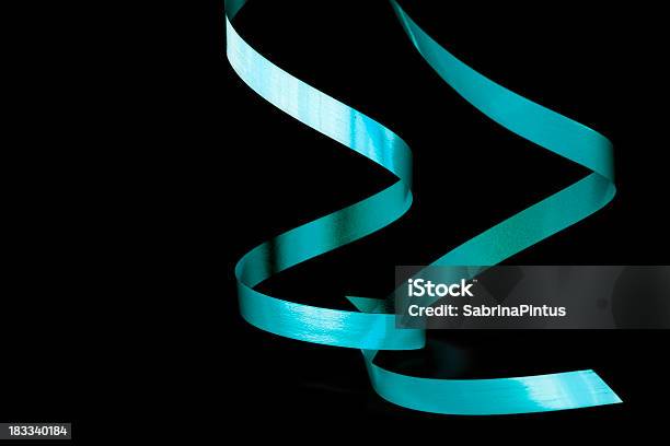 Two Green Ribbons Isolated On Black Stock Photo - Download Image Now - Streamer, Black Color, Green Color