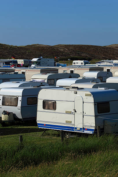 istock group of mobile homes and campers on a camp site 183340754