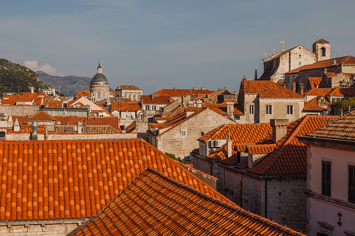 The town of Dubrovnik is known for its red-tile roofs, churches, narrow streets, and city walls.