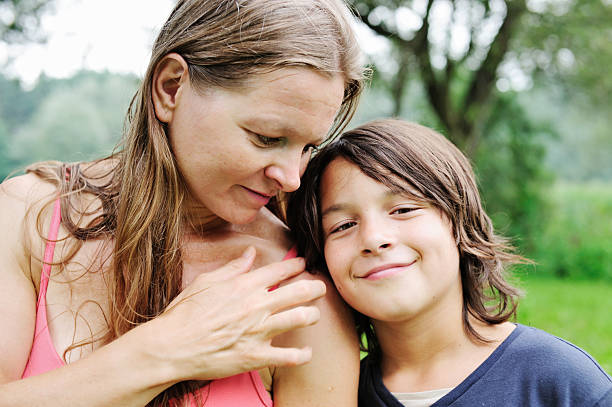 istock Young woman with her boy 183341136
