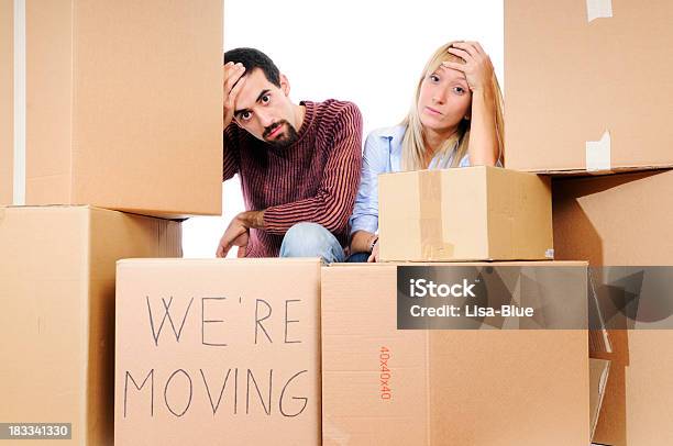 Stressed Young Couple Relocation Stock Photo - Download Image Now - Relocation, Exhaustion, White Background