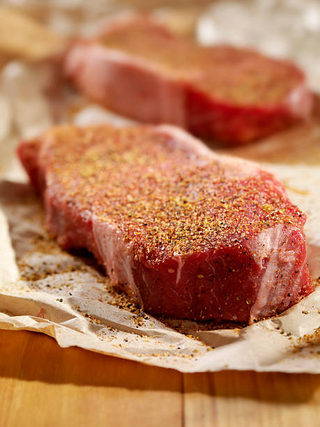 istock Raw Steaks Seasoned in Butcher Paper 183342677