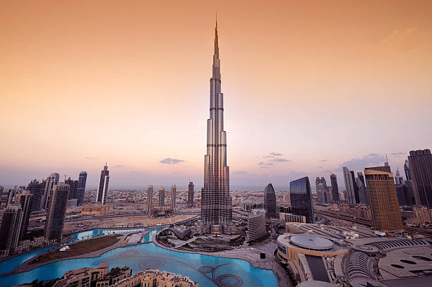 Stylized aerial view of Dubai City A panoramic view of the Dubai city skyline with the Burj Khalifa shown in the center.  The Burj Khalifa is the tallest building in the world. burj khalifa photos stock pictures, royalty-free photos & images