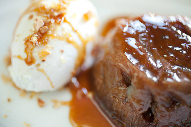 a lovely holiday dessert:  sweet, sticky persimmon pudding with toffee sauce and ice cream