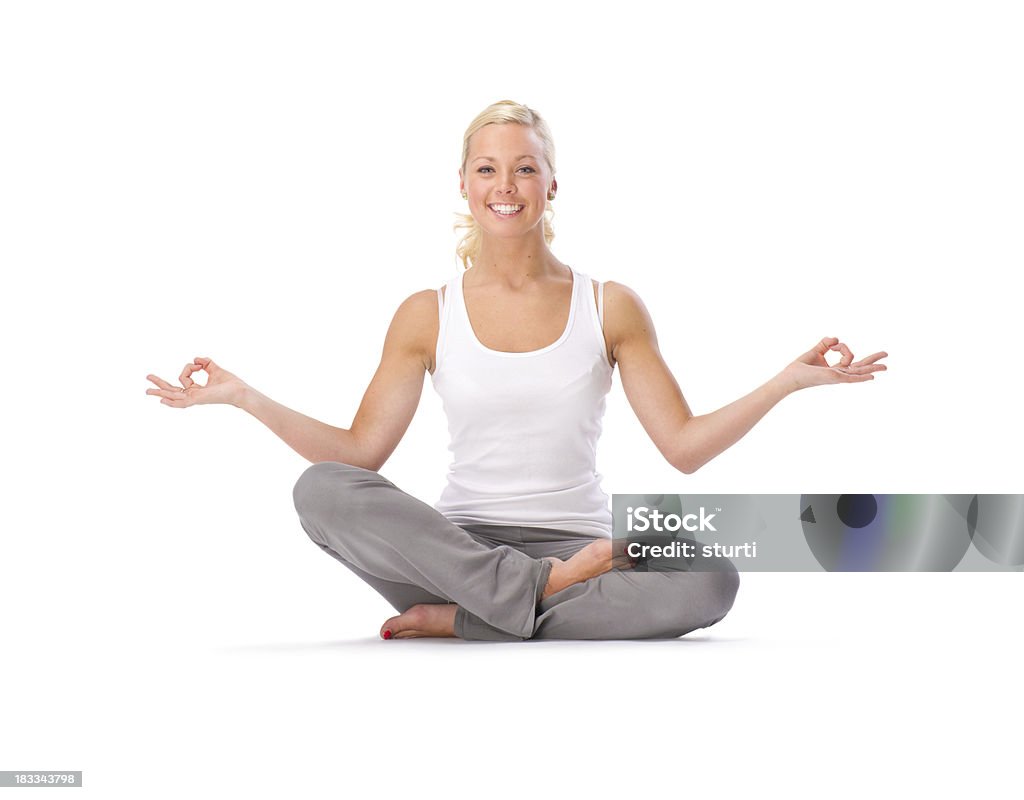 young woman practising her yoga positions 20-24 Years Stock Photo