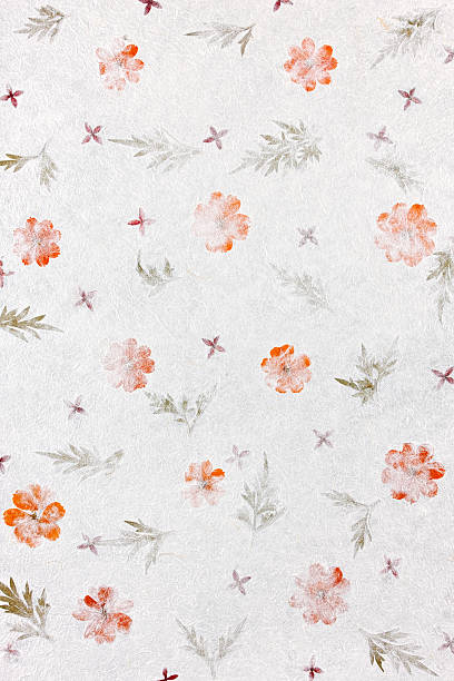 istock Handmade recycled flower and leaf paper background. 183344379